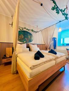 Ένα ή περισσότερα κρεβάτια σε δωμάτιο στο Apartment Jungle Escape +22 φωτογραφίες
