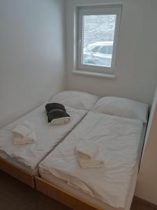 Postel nebo postele na pokoji v ubytování Hotel Bečva na Horní Bečvě