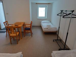 Postel nebo postele na pokoji v ubytování Hotel Bečva na Horní Bečvě