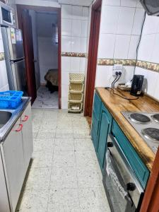 Kitchen o kitchenette sa Hostal Arrayan