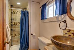 a bathroom with a sink and a shower at Winmar Cabins in Twin Lakes