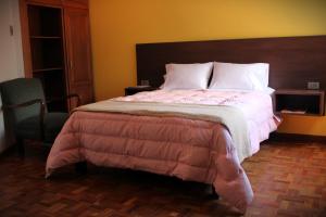 Postel nebo postele na pokoji v ubytování Kunan Hotel