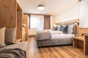 Postel nebo postele na pokoji v ubytování Pension Kumbichlhof