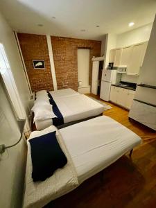 Ein Bett oder Betten in einem Zimmer der Unterkunft Nest Family Aparthotel - No Window