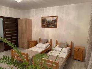 Agroturystyka Pod Dzwonnicą - Babia Góra客房内的一张或多张床位