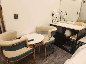 Posezení v ubytování Suwon Hotel Insta + 31 fotografií