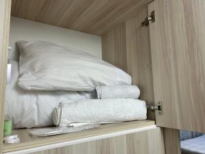 Ένα ή περισσότερα κρεβάτια σε δωμάτιο στο Porta Hostel