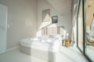 Ένα ή περισσότερα κρεβάτια σε δωμάτιο στο House Prestige Wood