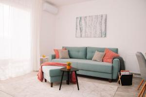 Posezení v ubytování Blue Apartment