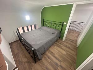 A bed or beds in a room at Holiday apartament