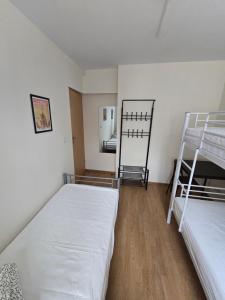 Postel nebo postele na pokoji v ubytování Rooms4Rest Skibicka - Private rooms for tourists - ATR Consulting Sp, z o,o,