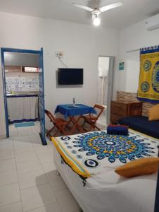 TV a/nebo společenská místnost v ubytování OLHO GREGO Hospedagem em ARRAIAL d'AJUDA