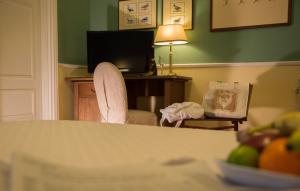 TV a/nebo společenská místnost v ubytování Parco del Lago Resort & SPA