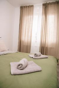 Postel nebo postele na pokoji v ubytování Blue Apartment