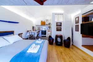 Ένα ή περισσότερα κρεβάτια σε δωμάτιο στο Casa del Marinaio - WiFi, Air Conditioning