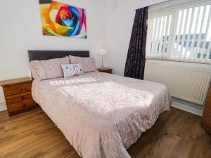 Postel nebo postele na pokoji v ubytování Beside The Sea - Ar Lan y Mor