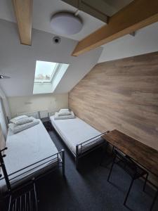 Postel nebo postele na pokoji v ubytování Rooms4Rest Skibicka - Private rooms for tourists - ATR Consulting Sp, z o,o,