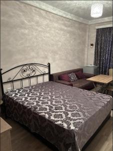 Rúm í herbergi á Hotel Meskheti Bakuriani