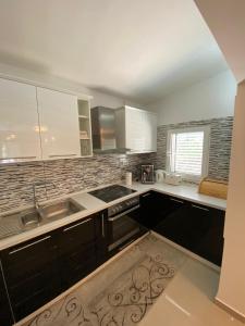 Η κουζίνα ή μικρή κουζίνα στο Apartments Stepen