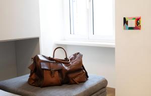 Area soggiorno di The Best Nest - Home Suite Home NEW OPENING