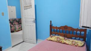 Katil atau katil-katil dalam bilik di Casa Veraneio