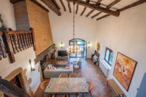 an overhead view of a living room with a chandelier at CC-1 Casa Mar y Viñas in Begur