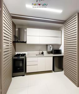 Η κουζίνα ή μικρή κουζίνα στο #1806G#Duplex St. Bueno.