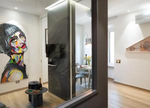 TV o dispositivi per l'intrattenimento presso The Best Nest - Home Suite Home NEW OPENING