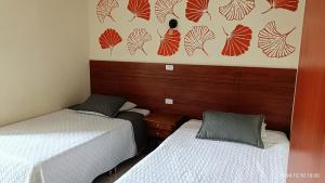 Postel nebo postele na pokoji v ubytování Hotel VIYAJE
