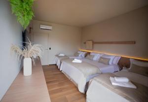 Postel nebo postele na pokoji v ubytování Morro dos Anjos Águas Quentes Hotel Resort OFICIAL