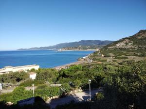 a view of the ocean from a hill at MAREVIGLIOSO Fronte Mare Sea Front in Magomadas