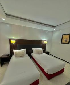 Letto o letti in una camera di Hotel Oscar 1