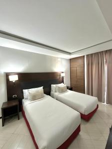 Letto o letti in una camera di Hotel Oscar 1