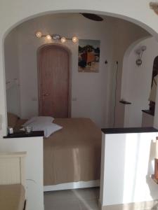 A bed or beds in a room at Civico 3