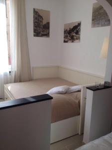 A bed or beds in a room at Civico 3