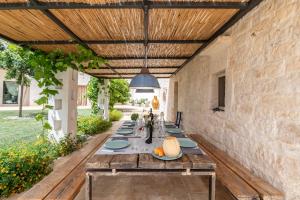 Patio nebo venkovní prostory v ubytování Trulli di Mezza
