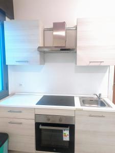 Kuchyň nebo kuchyňský kout v ubytování Venice Apartments