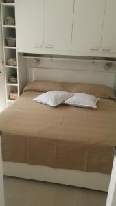 A bed or beds in a room at Civico 3