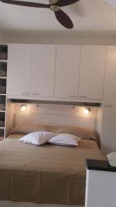 A bed or beds in a room at Civico 3