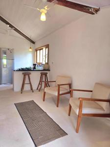 Khu vực ghế ngồi tại Top Houses 2 quartos Arraial 300m do Centro