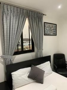 Ένα ή περισσότερα κρεβάτια σε δωμάτιο στο Luxury Modern 2 bed getaway Near Airport +18 φωτογραφίες
