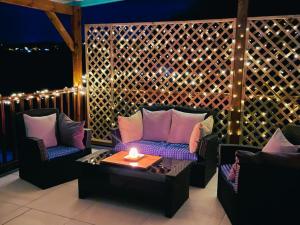 Espace Harmonie Deshaies - Vue Mer & Piscine Panoramique的休息区