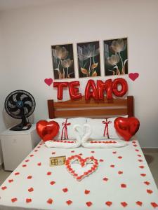 Cama ou camas em um quarto em Chalés e suítes lima