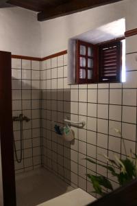 a bathroom with a shower with a window at Casa Rural Tintilla in Vega de San Mateo +27 photos