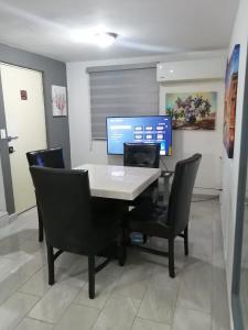 TV a/nebo společenská místnost v ubytování Casa completa en Escobedo NL + 6 fotografií