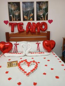 Cama ou camas em um quarto em Chalés e suítes lima
