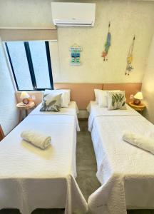 Villa Sapê 13客房内的一张或多张床位
