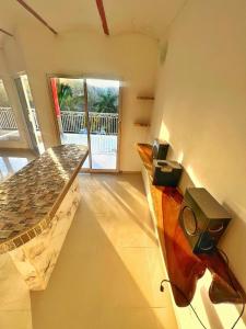 Μια τηλεόραση ή/και κέντρο ψυχαγωγίας στο Casa Lindo Estar