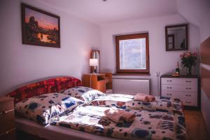 A bed or beds in a room at Vilka Stefi