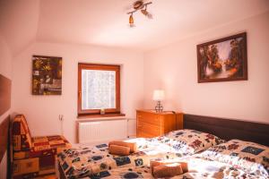 A bed or beds in a room at Vilka Stefi